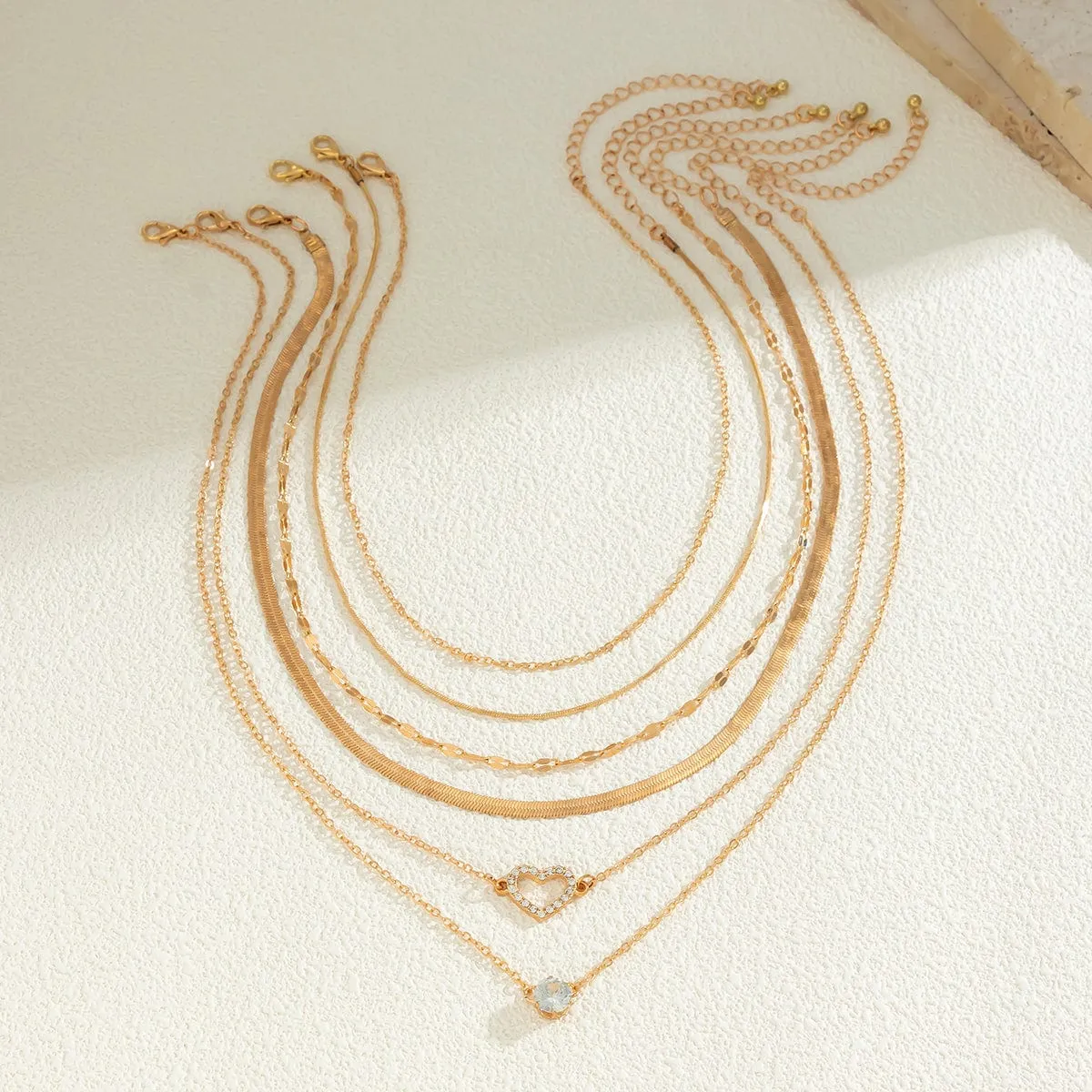 Elegant Layered CZ Inlaid Heart Pendant Snake Chain Necklace Set