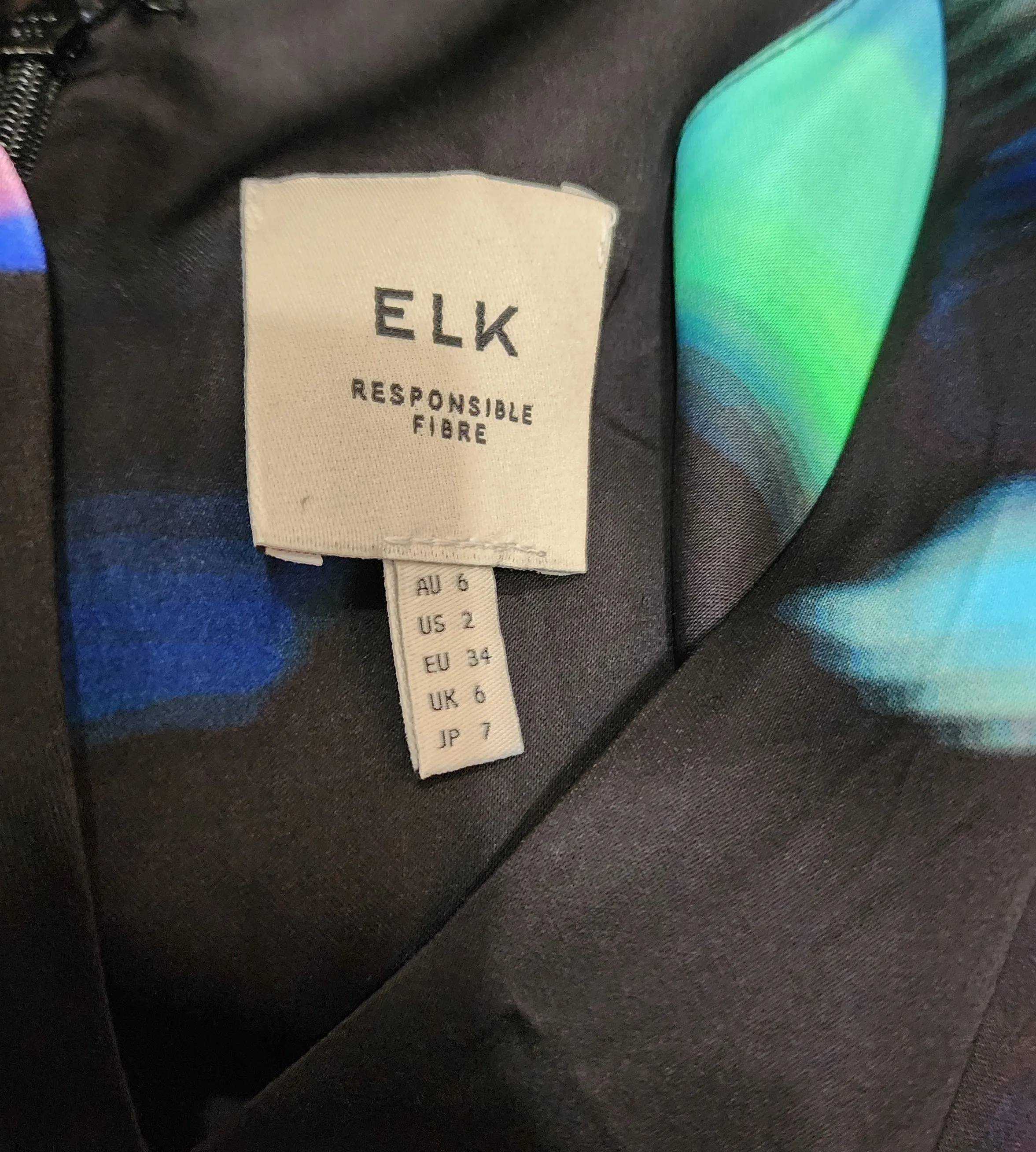 Elk black unique print dress size 8 (note: small pull)