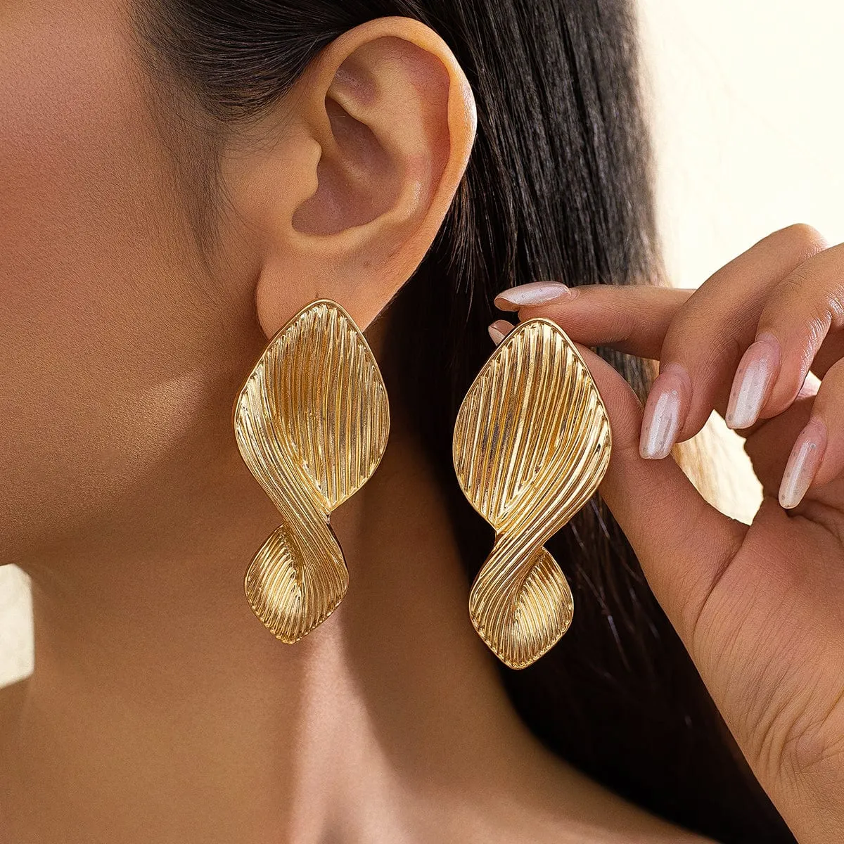 Stylish Chunky Textured Curved Ribbon Earrings