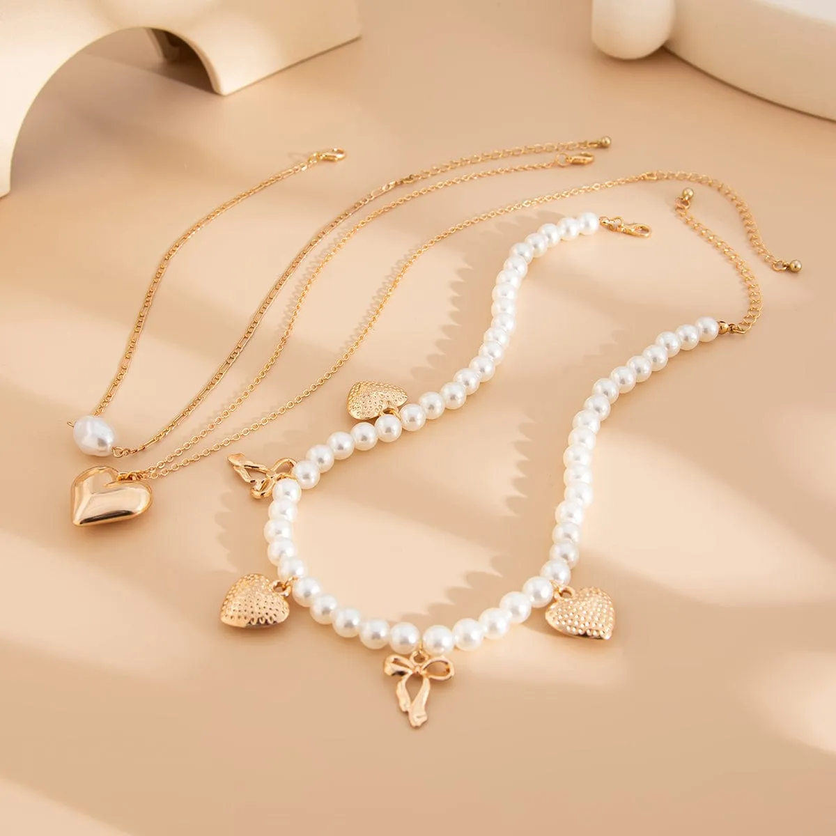 Trendy 3pcs Bowknot Heart Pendant Pearl Chain Necklace Set
